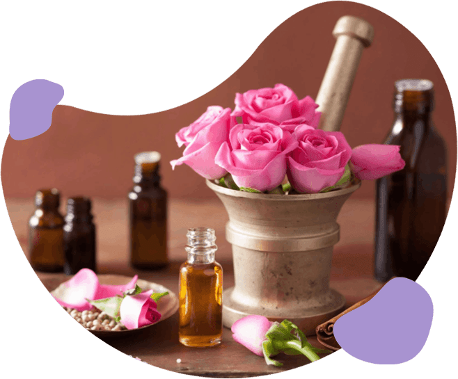A mortar and pestle with pink roses in it.